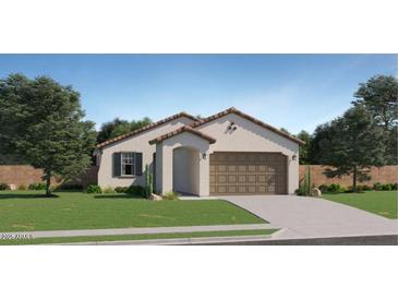 Charming single-story home featuring a neutral color scheme, a tile roof, and a two-car garage at 15060 W Hackamore Dr, Surprise, AZ 85387