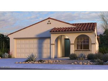 Charming single-story home with a tile roof, landscaped front yard, and attached two-car garage at 10905 E Texas Ave, Mesa, AZ 85212