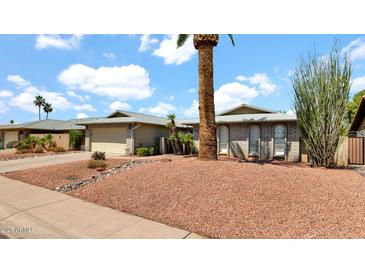 Charming single-story home with well-maintained landscaping and a two-car garage at 7120 N Via De La Sendero --, Scottsdale, AZ 85258