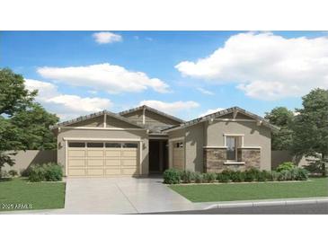 Charming one-story home featuring a two-car garage and stone accents at 4642 E Topaz Dr, San Tan Valley, AZ 85143