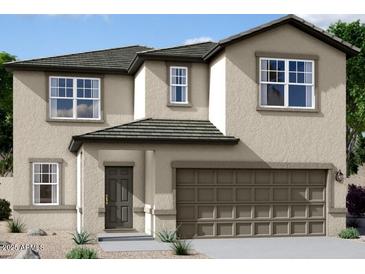 Charming two-story home featuring a neutral color palette, complemented by a spacious two-car garage and well-manicured landscaping at 6008 E Artemis Dr, Florence, AZ 85132