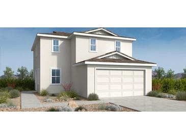 Charming two-story home featuring a two-car garage and low maintenance desert landscaping at 25204 N 165Th Ln, Surprise, AZ 85387