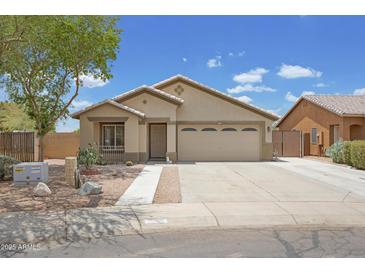 Inviting single-story home featuring desert landscaping and a spacious two-car garage at 3586 S Moccasin Trl, Gilbert, AZ 85297