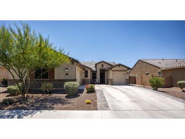 Charming single story home featuring desert landscaping and a spacious driveway in a desirable neighborhood at 18493 W Hiddenview Dr, Goodyear, AZ 85338