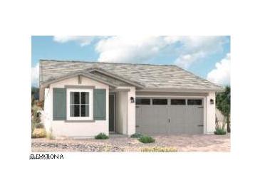 Charming single-story home with gray two car garage and light-colored stucco, complemented by decorative shutters at 17967 W Allen St, Goodyear, AZ 85338