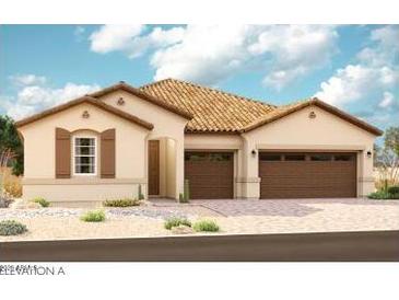 Inviting single-story home with a tile roof and a three-car garage, blending comfort and convenience at 20155 W Monterey Way, Buckeye, AZ 85396