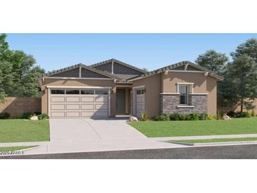 Beautiful single-story home with a two-car garage and well-maintained landscaping at 2897 E Lucky Horseshoe Ln, San Tan Valley, AZ 85140