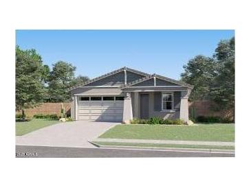 Charming single-story home featuring a two-car garage, landscaped front yard, and welcoming entrance at 38233 N Stillmeadow Rd, San Tan Valley, AZ 85140