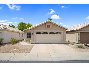 Charming single-story home with a two-car garage and low-maintenance desert landscaping at 4615 W Del Rio St, Chandler, AZ 85226
