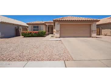Charming single-Gathering home featuring a well-maintained yard and a two-car garage at 764 E Shannon St, Chandler, AZ 85225