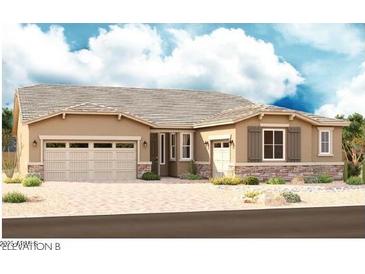 Inviting single-story home featuring a two-car garage, stone accents, neutral color palette, and well-manicured landscaping at 20256 W Monterey Way, Buckeye, AZ 85396