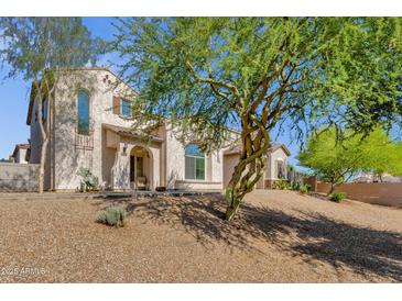 Charming single-Gathering home showcasing desert landscaping and a welcoming front entrance at 8429 W Vernon Ave, Phoenix, AZ 85037