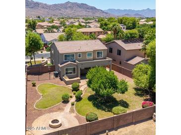 Aerial view of the home showcasing the backyard, landscaping, and surrounding neighborhood at 2116 W Fawn Dr, Phoenix, AZ 85041