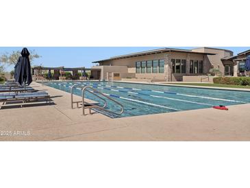 Community pool offers lap lanes and comfortable seating areas at 20801 N 90Th Pl # 255, Scottsdale, AZ 85255