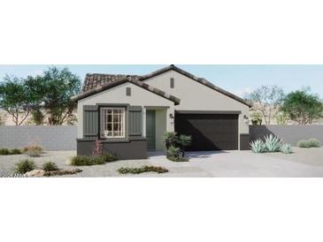 Charming single-Gathering home featuring a neutral palette, two-car garage and low-maintenance landscaping at 8916 E Covina St, Mesa, AZ 85207