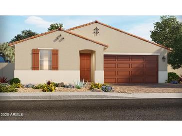 Inviting single-story home showcasing desert landscaping and a private two-car garage at 189 N 175Th Ave, Goodyear, AZ 85338