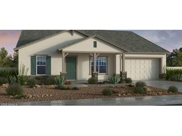 Charming single story home featuring a two car garage, inviting entryway, and desert landscaping at 21557 S 191St Pl, Queen Creek, AZ 85142