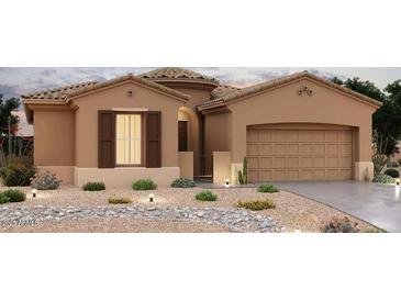 Inviting single-story home featuring a tiled roof, neutral stucco exterior, and a two-car garage at 16427 W Christy Dr, Surprise, AZ 85388