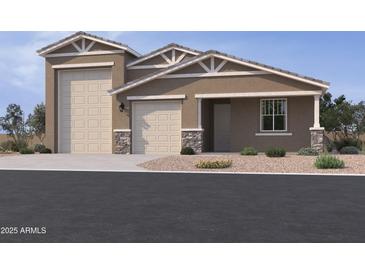 Charming single-Gathering home with three-car garage and desert landscaping at 15730 W Brown St, Waddell, AZ 85355