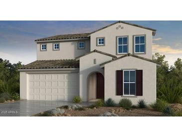 Charming two-story home featuring a neutral color palette, well-manicured landscaping, and a two car garage at 17149 W Sweet Iron Pass, Surprise, AZ 85387