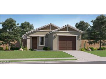 Charming single-story home with a two-car garage, well-manicured lawn, and desert landscaping at 25082 N 174Th Ln, Surprise, AZ 85387