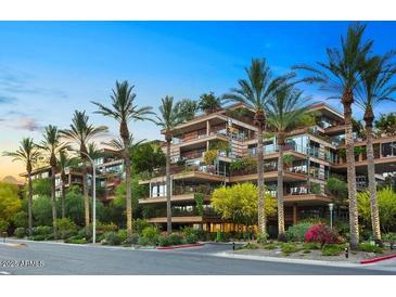 Contemporary condominium with private balconies and lush, mature landscaping at 7117 E Rancho Vista Dr # 3010, Scottsdale, AZ 85251