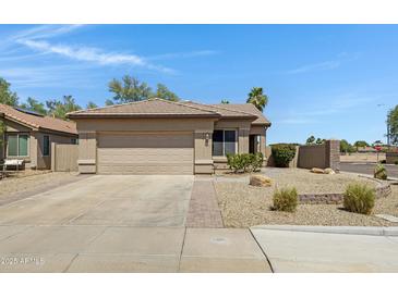 Charming single-story home with desert landscaping and a two-car garage in a desirable neighborhood at 1821 S Navajo Way, Chandler, AZ 85286