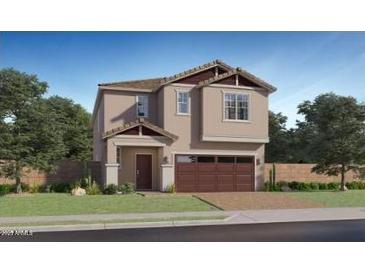 Two story home featuring a two-car garage, neutral color palette, and low maintenance landscaping at 9534 W Catalina Dr, Phoenix, AZ 85037