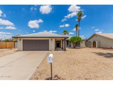 Charming single-story home featuring a well-maintained yard and a two-car garage, perfect for suburban living at 4226 W Evans Dr, Phoenix, AZ 85053