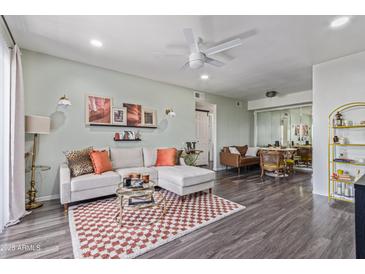 Bright living room with modern furniture, stylish decor, and an open floor plan at 2625 E Indian School Rd # 343, Phoenix, AZ 85016