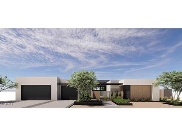 Stunning contemporary home featuring clean lines, neutral colors, and desert landscaping for modern curb appeal at 8618 E Irish Hunter Trl, Scottsdale, AZ 85258