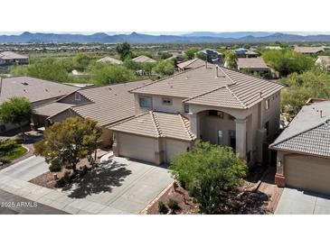 Beautiful two-story home with desert landscaping and scenic mountain views in a desirable neighborhood at 4416 W Magellan Dr, New River, AZ 85087