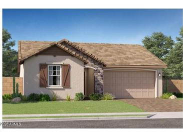 Charming single-story home with stone accents, a two-car garage, and a well-manicured lawn at 20925 S 231St Way, Queen Creek, AZ 85142