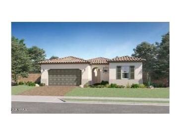 Charming single-story home with a tile roof, arched entryway, and attached two-car garage, surrounded by a well-maintained lawn at 23008 E Roundup Way, Queen Creek, AZ 85142