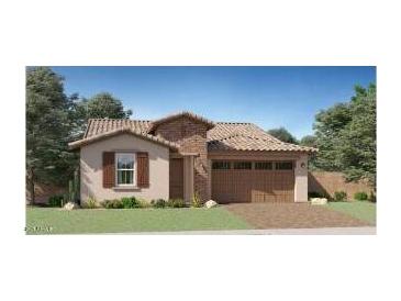 Charming single-story home with a desert landscape, tile roof, and inviting curb appeal at 23089 E Saddle Way, Queen Creek, AZ 85142