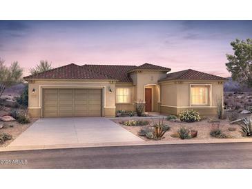 Inviting single-story home featuring a two-car garage, desert landscaping, and a charming front entrance at 26936 W Mcrae Dr, Buckeye, AZ 85396