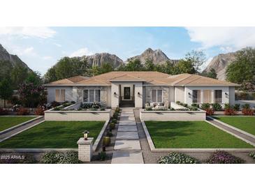 Stunning single-story home with mountain views, beautiful desert landscaping, and charming walkway at 1897 E Long Rifle Rd, Phoenix, AZ 85086