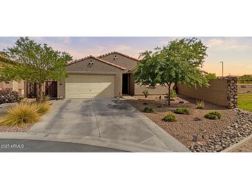 Charming single-story home featuring desert landscaping and a two-car garage at 37103 N El Morro Trl, San Tan Valley, AZ 85140