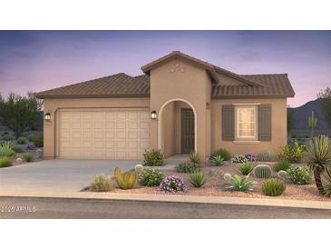Charming single-story home featuring desert landscaping, a two-car garage, and a covered entryway, perfect for Southwest living at 18165 E Tiffany Dr, Queen Creek, AZ 85142