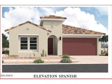 Charming Spanish-style home featuring a red tile roof and a two-car garage at 36860 W Santa Maria St St, Maricopa, AZ 85138