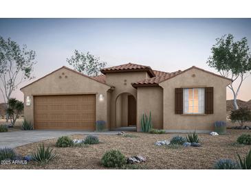 Charming single-story home featuring desert landscaping, a tile roof, and a two-car garage at 42980 W Palo Abeto Dr, Maricopa, AZ 85138