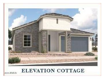 Charming cottage-style home featuring stone accents, a covered entry, and a two-car garage at 36907 W Santa Maria St, Maricopa, AZ 85138
