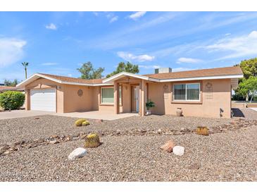 Single-story home featuring a desert-scape front yard, covered entry, and attached garage, located in a sunny locale at 636 S Rosemont --, Mesa, AZ 85206