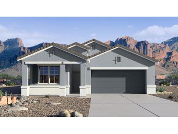 Charming single-story home with neutral paint, a two-car garage and mountain views at 22680 N Lynn St, Maricopa, AZ 85138