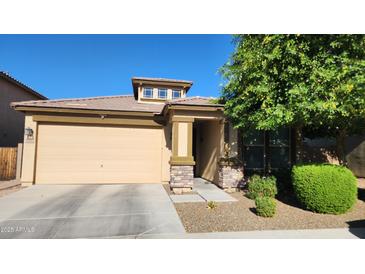 Inviting single-Gathering home with a two-car garage and a well-maintained front yard at 7925 S 24Th Way, Phoenix, AZ 85042