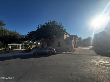 Residential street view of single-Gathering home with mature landscaping at 876 S Colonial Dr, Gilbert, AZ 85296