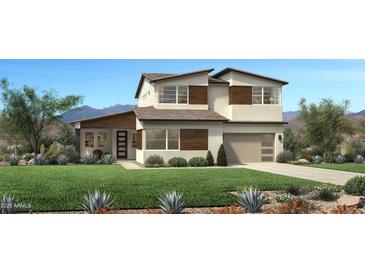 Stunning two-story home boasts a modern design, lush lawn, and a convenient two-car garage at 3362 W Sunstone Dr, San Tan Valley, AZ 85144