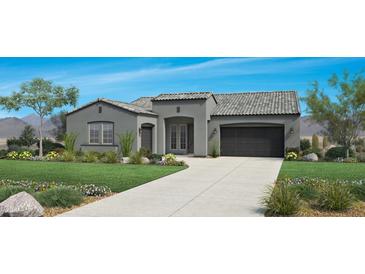 Charming single-story home featuring a well-manicured front lawn, neutral color palette, and a two-car garage at 3363 W Sunstone Dr, San Tan Valley, AZ 85144