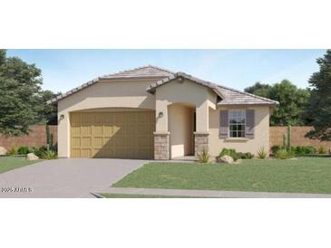 Charming single-story home with a two-car garage, neutral-colored exterior, and well-manicured lawn at 14955 W Hackamore Dr, Surprise, AZ 85387