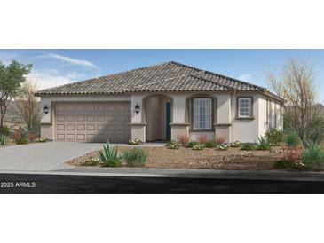 Charming single-story home featuring a neutral color palette, landscaped front yard, and a two-car garage at 1859 S 181St Dr, Goodyear, AZ 85338